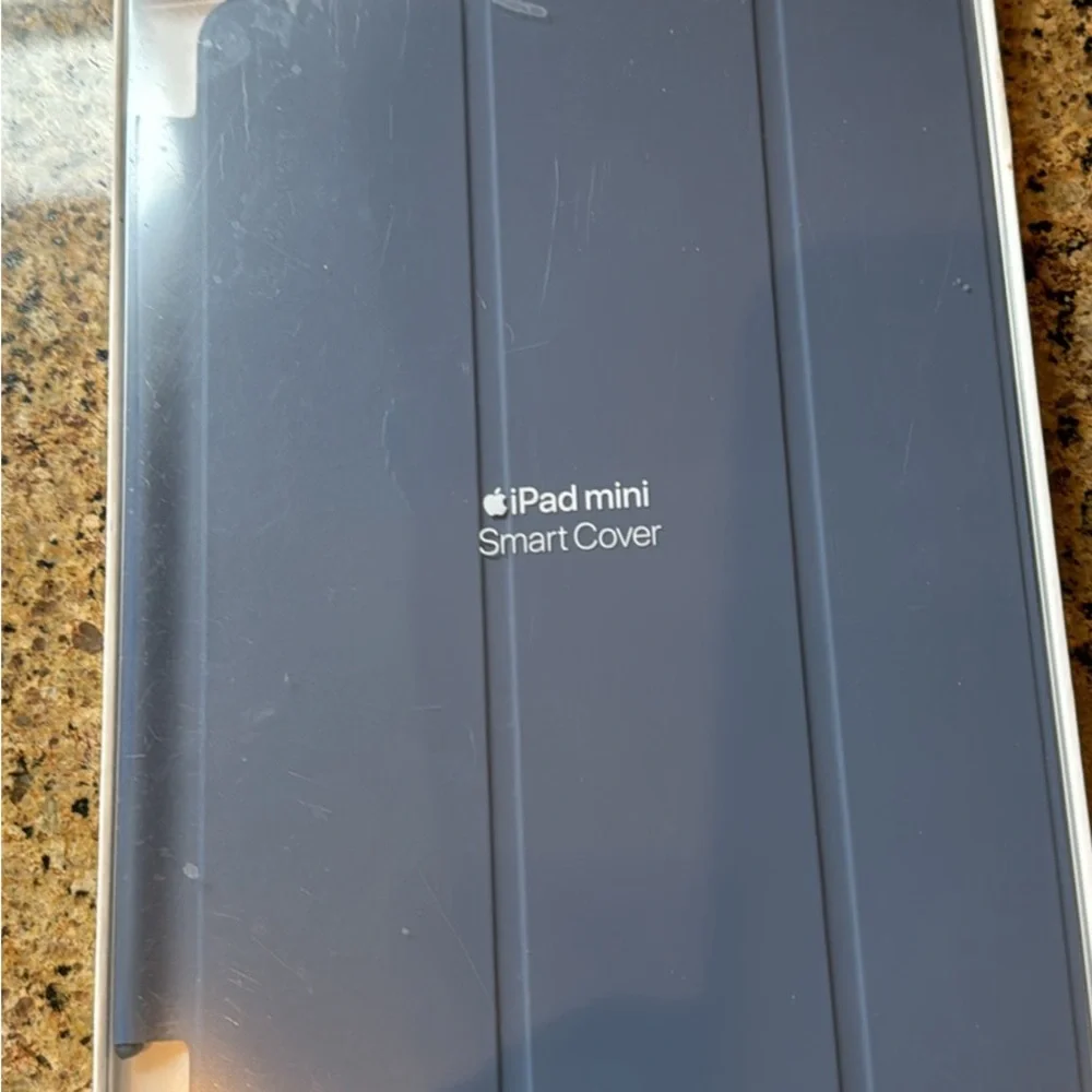 Brand new never used mini IPAD cover